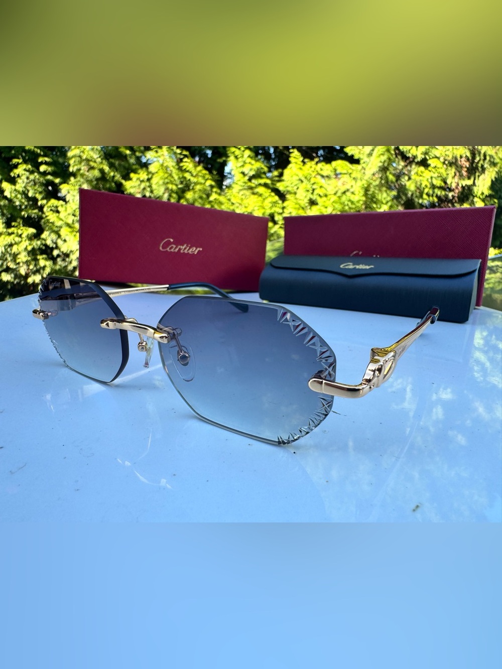 Cartier Gold Temple Rimless Sunglasses with Gradient Blue Lenses